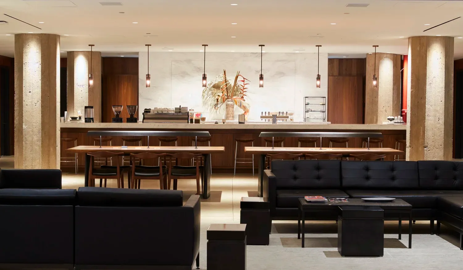 Hotel lounge and dining area with bar seating